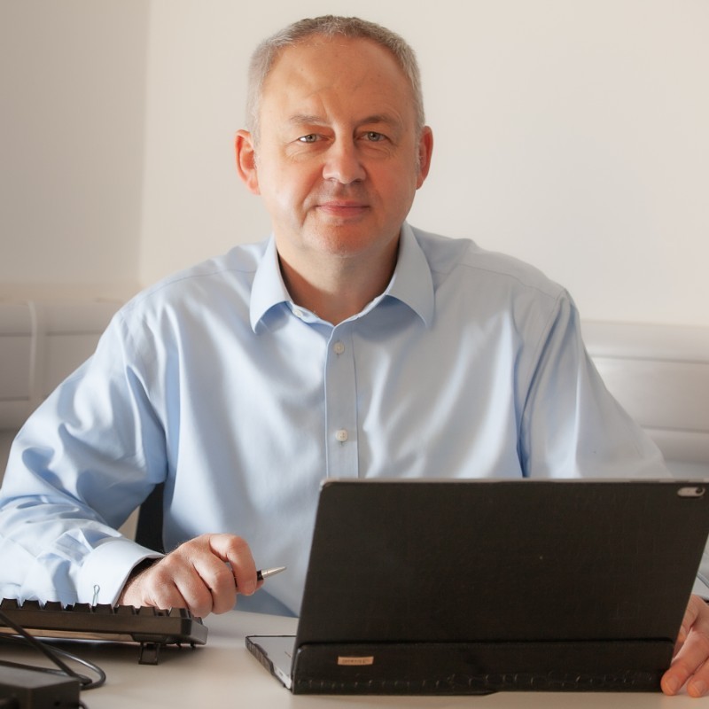 Derek Carter, Director of Guiding North HR, at his desk